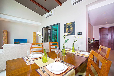 Dining,  Living and Kitchen Area with Garden and Pool View